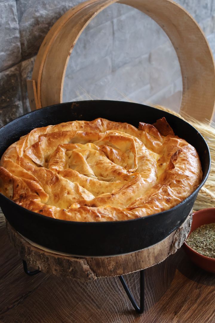 Vita banitsa in a cast iron pan, product photography we shot for Kato Edno Vreme bakery